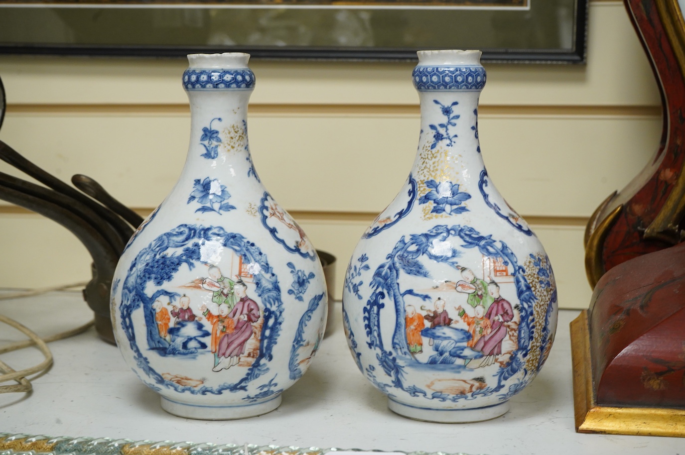 A pair of late 18th century Chinese export Mandarin guglets drilled, 24cm high